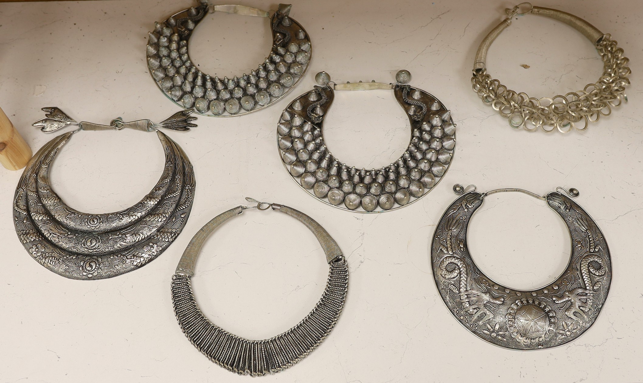 Six various south East Asian white metal collars